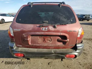 2001 Hyundai Santa Fe GLS with VIN KM8SC83D01U017352, listed as a Copart auction lot 82592024 with 253,442 mi miles and Salvage Title. Bid and sale history available at carsss.com. Image 6.
