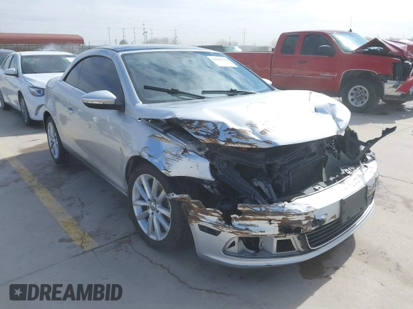 2012 Volkswagen Eos Komfort with VIN WVWBW7AH5CV005738, listed as a IAAI auction lot 41619744 with 131,340 mi miles and . Bid and sale history available at DreamBid. Image 1.