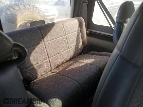 2001 Jeep Wrangler Sport with VIN 1J4FA49S21P346217, listed as a Copart auction lot 46133815 with 103,929 mi miles and Salvage Title. Bid and sale history available at carsss.com. Image 11.