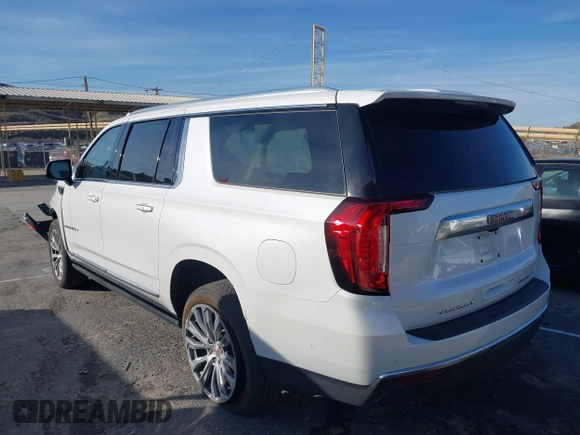 2023 GMC Yukon XL Denali with VIN 1GKS2JKT0PR478011, listed as a IAAI auction lot 41596312 with 21,286 mi miles. Bid and sale history available at carsss.com. Image 3.