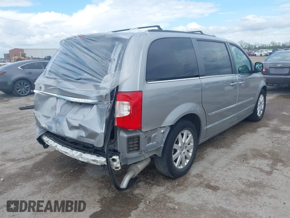 2016 Chrysler Town & Country Touring with VIN 2C4RC1BG0GR213058, listed as a IAAI auction lot 41910462 with 125,013 mi miles and . Bid and sale history available at DreamBid. Image 4.