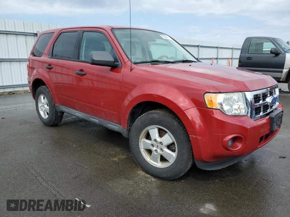 2011 Ford Escape XLS with VIN 1FMCU9C75BKC31381, listed as a Copart auction lot 52886575 with 128,640 mi miles and Salvage title. Bid and sale history available at DreamBid. Image 4.