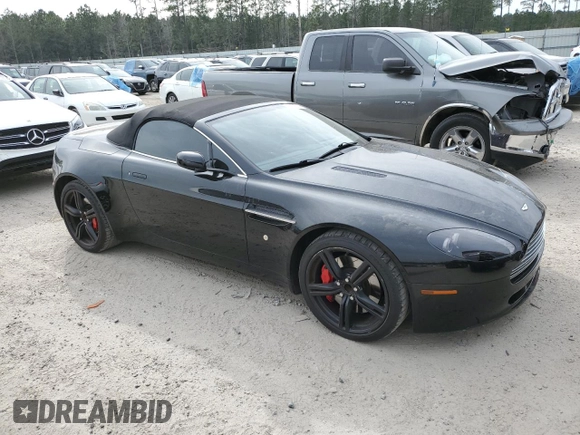 2009 Aston Martin Vantage z VIN SCFBF04CX9GD11942, wystawiony jako Copart lot #43771214 z przebiegiem 52 730 mil mil oraz . Historia ofert i sprzedaży dostępna na DreamBid. Obrazek 4.