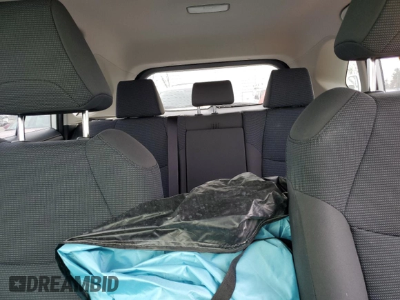 2023 Toyota RAV4 Hybrid LE with VIN JTMMWRFV3PD570648, listed as a Copart auction lot 86983174 with 27,258 mi miles and Salvage title. Bid and sale history available at DreamBid. Image 10.