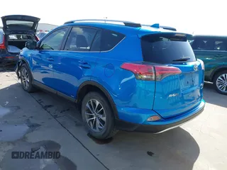 2016 Toyota RAV4 Hybrid XLE with VIN JTMRJREV5GD014170, listed as a IAAI auction lot 41822178 with 89,676 mi miles. Bid and sale history available at carsss.com. Image 3.