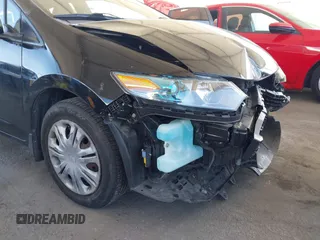 2010 Honda Insight LX with VIN JHMZE2H54AS021815, listed as a IAAI auction lot 42259951 with 137,436 mi miles and . Bid and sale history available at DreamBid. Image 13.