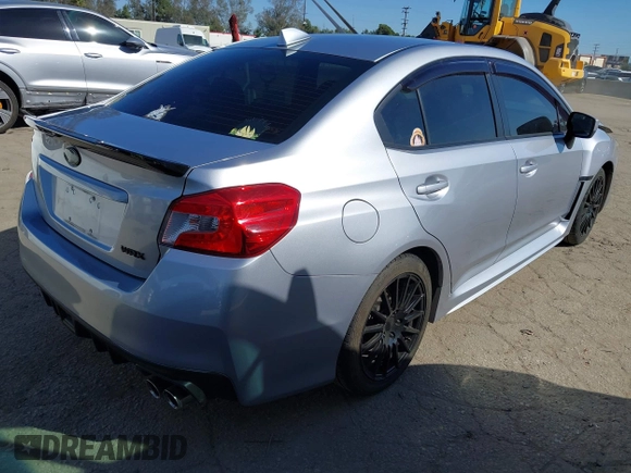 2015 Subaru WRX Premium with VIN JF1VA1D66F9814459, listed as a IAAI auction lot 41831344 with 74,892 mi miles. Bid and sale history available at carsss.com. Image 4.
