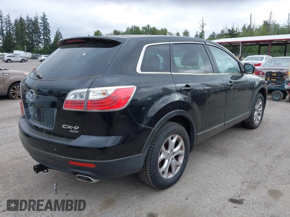 2011 Mazda CX-9 Touring with VIN JM3TB3CV0B0331123, listed as a IAAI auction lot 42260158 with 130,411 mi miles and . Bid and sale history available at DreamBid. Image 4.