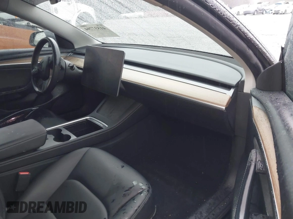 2023 Tesla Model 3 z VIN 5YJ3E1EA3PF579776, wystawiony jako IAAI lot #41537794 z przebiegiem Nie podano mil oraz . Historia ofert i sprzedaży dostępna na DreamBid. Obrazek 5.