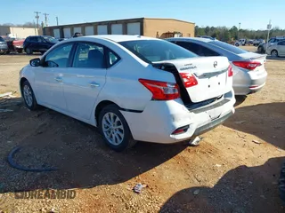 2019 Nissan Sentra S z VIN 3N1AB7AP8KY379747, wystawiony jako IAAI lot #41376492 z przebiegiem 92 328 mil mil oraz . Historia ofert i sprzedaży dostępna na DreamBid. Obrazek 3.
