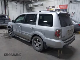 2007 Honda Pilot EX-L with VIN 2HKYF18607H511219, listed as a IAAI auction lot 41368619 with 270,722 mi miles and . Bid and sale history available at DreamBid. Image 3.