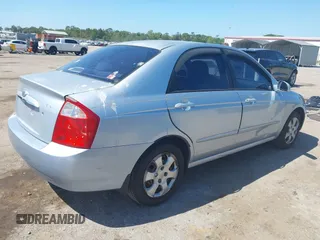 2005 Kia Spectra LX with VIN KNAFE121955107403, listed as a IAAI auction lot 42055036 with 157,605 mi miles. Bid and sale history available at carsss.com. Image 4.