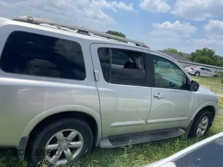 2009 Nissan Armada LE z VIN 5N1BA08C29N602446, wystawiony jako IAAI lot #42312601 z przebiegiem Nie podano mil oraz . Historia ofert i sprzedaży dostępna na DreamBid. Obrazek 14.