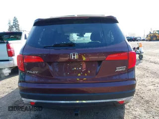2016 Honda Pilot Touring with VIN 5FNYF6H99GB094933, listed as a IAAI auction lot 41967730 with 98,841 mi miles. Bid and sale history available at carsss.com. Image 16.