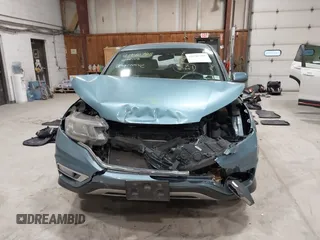 2015 Honda CR-V EX with VIN 2HKRM4H57FH614090, listed as a IAAI auction lot 41940788 with 334,805 mi miles and . Bid and sale history available at DreamBid. Image 13.