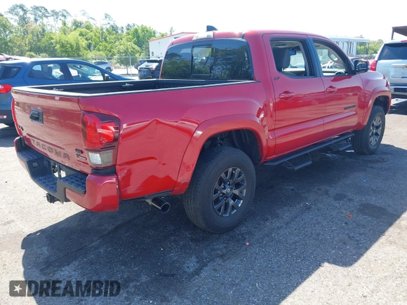 2022 Toyota Tacoma SR with VIN 3TMCZ5AN7NM470900, listed as a IAAI auction lot 42060911 with 38,869 mi miles and . Bid and sale history available at DreamBid. Image 4.