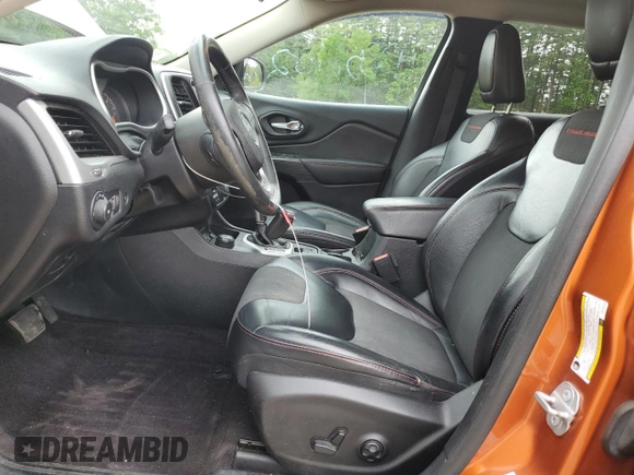 2016 Jeep Cherokee Trailhawk with VIN 1C4PJMBS2GW255368, listed as a Copart auction lot 59010305 with 105,667 mi miles and Salvage title. Bid and sale history available at DreamBid. Image 7.