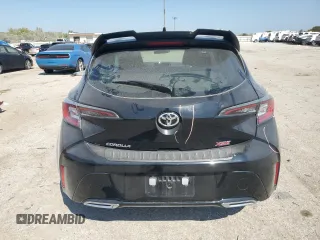 2019 Toyota Corolla Hatchback SE with VIN JTNK4RBE8K3049471, listed as a Copart auction lot 71502434 with 9,591 mi miles and Salvage Title. Bid and sale history available at carsss.com. Image 6.