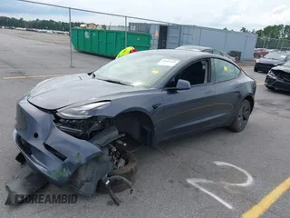 2023 Tesla Model 3 z VIN 5YJ3E1EA1PF449575, wystawiony jako IAAI lot #42457119 z przebiegiem 51 084 mil mil oraz . Historia ofert i sprzedaży dostępna na DreamBid. Obrazek 2.