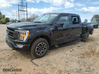 2023 Ford F-150 XL with VIN 1FTFW1E59PKE02763, listed as a Copart auction lot 49326355 with 26,674 mi miles and Salvage Title. Bid and sale history available at carsss.com. Image 1.