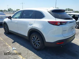 2020 Mazda CX-9 Sport with VIN JM3TCABY1L0406720, listed as a IAAI auction lot 42304144 with 75,887 mi miles and . Bid and sale history available at DreamBid. Image 3.