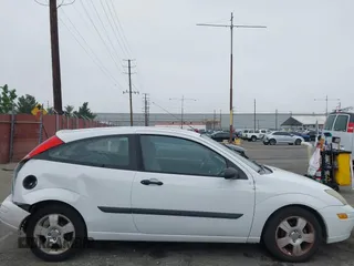 2003 Ford Focus ZX3 with VIN 3FAFP31Z23R147547, listed as a IAAI auction lot 42426117 with 129,860 mi miles and . Bid and sale history available at DreamBid. Image 12.