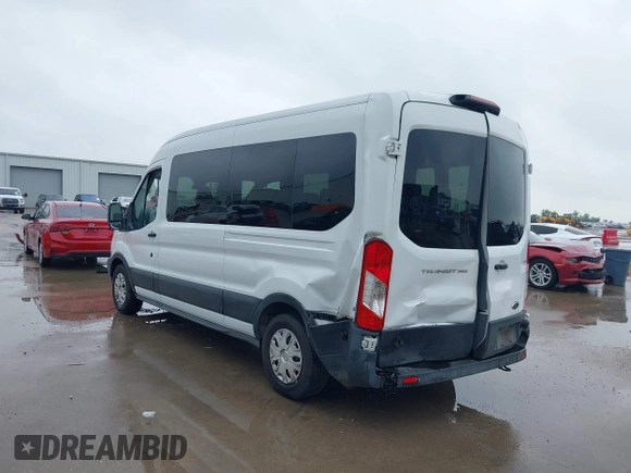 2019 Ford Transit Passenger XL with VIN 1FBAX2CM5KKA36711, listed as a IAAI auction lot 41660414 with 205,719 mi miles and . Bid and sale history available at DreamBid. Image 3.