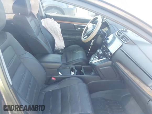 2018 Honda CR-V Touring z VIN 5J6RW2H93JL004834, wystawiony jako IAAI lot #42351364 z przebiegiem 63 746 mil mil oraz . Historia ofert i sprzedaży dostępna na DreamBid. Obrazek 5.