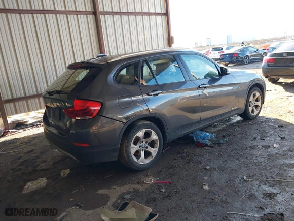 2013 BMW X1 28i with VIN WBAVM1C53DVW43228, listed as a IAAI auction lot 41301776 with 61,323 mi miles. Bid and sale history available at carsss.com. Image 4.