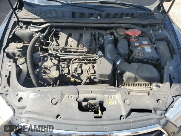2013 Ford Taurus Limited with VIN 1FAHP2F89DG146004, listed as a Copart auction lot 73048674 with 163,650 mi miles and Salvage Title. Bid and sale history available at DreamBid. Image 11.