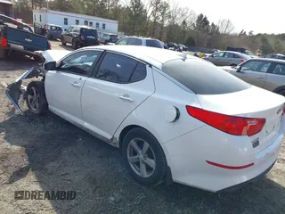 2015 Kia Optima LX with VIN 5XXGM4A75FG386704, listed as a IAAI auction lot 41344996 with 266,993 mi miles and . Bid and sale history available at DreamBid. Image 3.