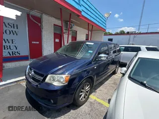 2014 Dodge Grand Caravan SXT with VIN 2C4RDGCG1ER308403, listed as a Copart auction lot 56712885 with 131,847 mi miles and Clean Title. Bid and sale history available at DreamBid. Image 2.