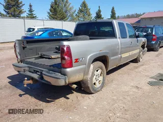 2003 Chevrolet Silverado 1500 LS with VIN 2GCEK19T231104873, listed as a IAAI auction lot 41910444 with 208,692 mi miles. Bid and sale history available at carsss.com. Image 4.