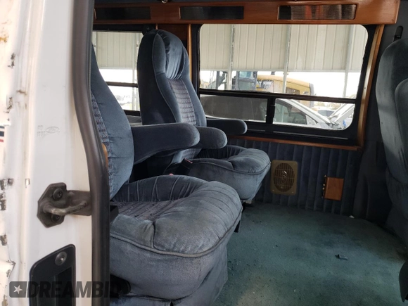 1997 Ford Econoline Commercial z VIN 1FDEE14L8VHB55692, wystawiony jako Copart lot #77627564 z przebiegiem 124 927 mil mil oraz Szkody całkowita. Historia ofert i sprzedaży dostępna na DreamBid. Obrazek 11.
