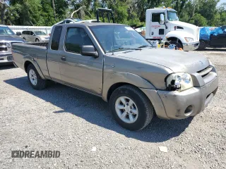2004 Nissan Frontier XE with VIN 1N6DD26T54C472795, listed as a Copart auction lot 57382115 with 200,903 mi miles and Salvage title. Bid and sale history available at DreamBid. Image 4.