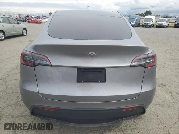 2025 Tesla Model Y Long Range with VIN 7SAYGDED7SF227582, listed as a Copart auction lot 47556595 with 5,340 mi miles and Salvage Title. Bid and sale history available at DreamBid. Image 6.