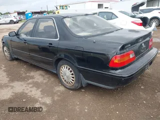 1993 Acura Legend L with VIN JH4KA7660PC010335, listed as a IAAI auction lot 42163696 with 75,309 mi miles and . Bid and sale history available at DreamBid. Image 3.