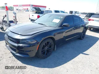 2018 Dodge Charger SXT with VIN 2C3CDXBG8JH134938, listed as a IAAI auction lot 42021136 with 127,596 mi miles and . Bid and sale history available at DreamBid. Image 2.