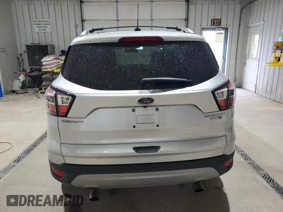 2017 Ford Escape Titanium with VIN 1FMCU9JD9HUC58945, listed as a Copart auction lot 52341485 with 31,074 mi miles and Salvage Title. Bid and sale history available at carsss.com. Image 6.
