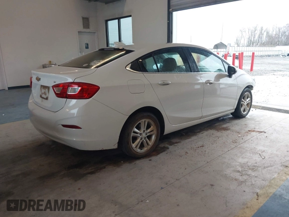 2017 Chevrolet Cruze LT with VIN 1G1BE5SM5H7215831, listed as a IAAI auction lot 41318984 with 123,091 mi miles and . Bid and sale history available at DreamBid. Image 4.