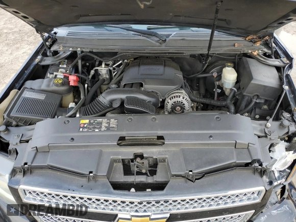 2014 Chevrolet Suburban LT with VIN 1GNSCJE01ER222961, listed as a Copart auction lot 84841744 with 168,131 mi miles and Salvage title. Bid and sale history available at DreamBid. Image 13.