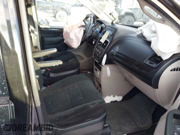2012 Dodge Grand Caravan SE with VIN 2C4RDGBG7CR139874, listed as a IAAI auction lot 41377432 with 136,870 mi miles and . Bid and sale history available at DreamBid. Image 5.