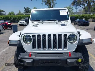 2018 Jeep Wrangler Unlimited Rubicon with VIN 1C4HJXFN8JW215023, listed as a IAAI auction lot 42227099 with 62,195 mi miles and . Bid and sale history available at DreamBid. Image 12.