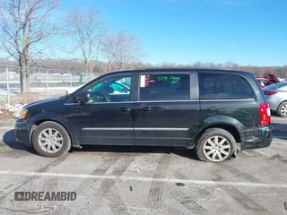 2016 Chrysler Town & Country Touring with VIN 2C4RC1BG7GR231704, listed as a IAAI auction lot 41306140 with 165,890 mi miles. Bid and sale history available at carsss.com. Image 14.