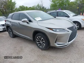 2022 Lexus RX 350 z VIN 2T2AZMDA7NC352957, wystawiony jako IAAI lot #42297457 z przebiegiem 34 576 mil mil oraz . Historia ofert i sprzedaży dostępna na DreamBid. Obrazek 1.