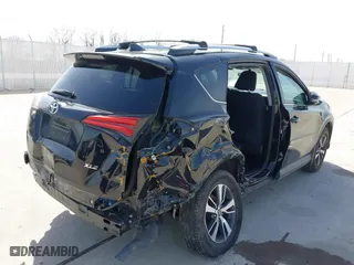 2016 Toyota RAV4 XLE with VIN 2T3WFREV9GW292772, listed as a IAAI auction lot 41727898 with 117,922 mi miles. Bid and sale history available at carsss.com. Image 6.