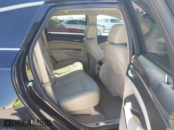 2012 Cadillac SRX Performance Collection with VIN 3GYFNBE30CS658628, listed as a IAAI auction lot 41968266 with 113,810 mi miles. Bid and sale history available at carsss.com. Image 8.