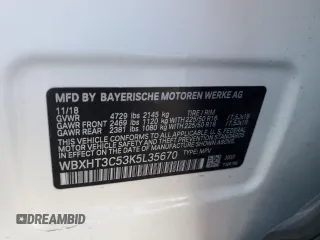 2019 BMW X1 xDrive28i with VIN WBXHT3C53K5L35670, listed as a Copart auction lot 53493245 with 14,201 mi miles and Salvage Title. Bid and sale history available at carsss.com. Image 12.