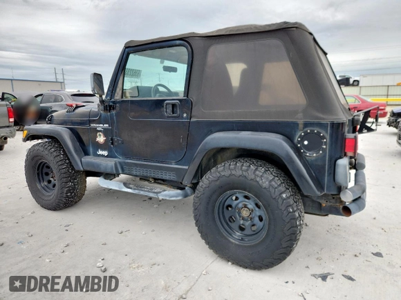2000 Jeep Wrangler Sahara with VIN 1J4FA59S1YP777549, listed as a Copart auction lot 63622335 with 197,426 mi miles and Clean title. Bid and sale history available at DreamBid. Image 2.