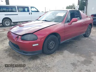 1995 Honda del Sol S with VIN JHMEG1144SS003580, listed as a IAAI auction lot 41701598 with 276,749 mi miles. Bid and sale history available at carsss.com. Image 2.